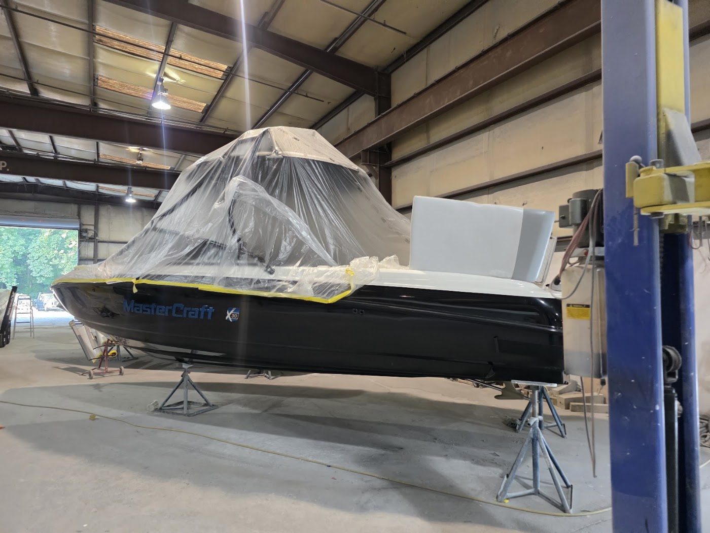 Boat wrapped and prepped in the bay
